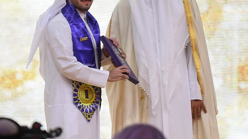 GU-Q Graduate Khalid Abdulhamed Marafi with His Highness Sheikh Tamim Bin Hamad Al Thani during the 13th Education Excellence Day Award ceremony