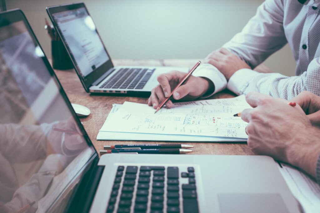 researchers collaborating over a shared document