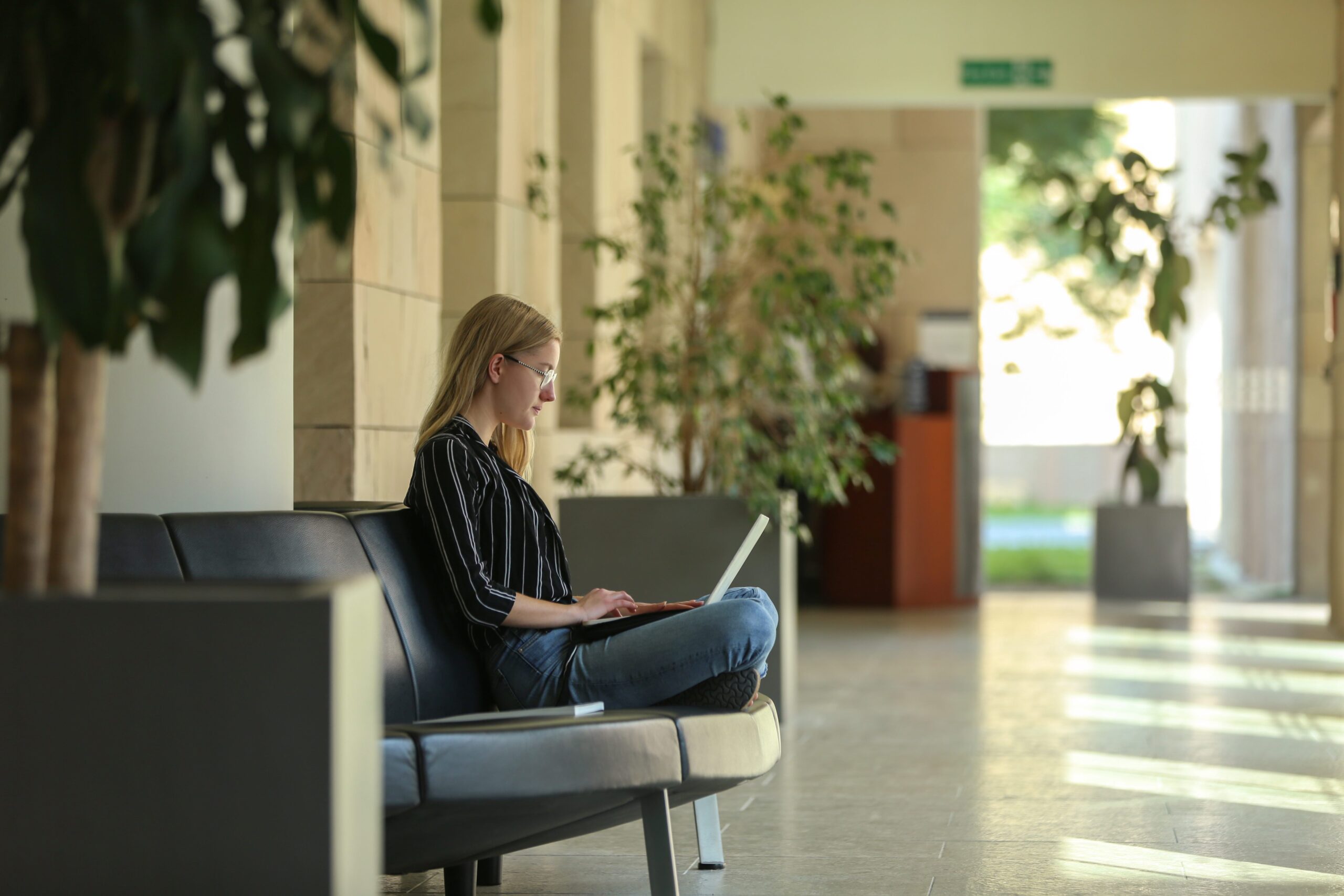 A student studying on campus