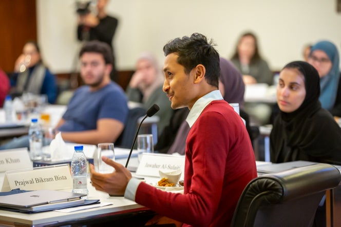 A student speaking at an event