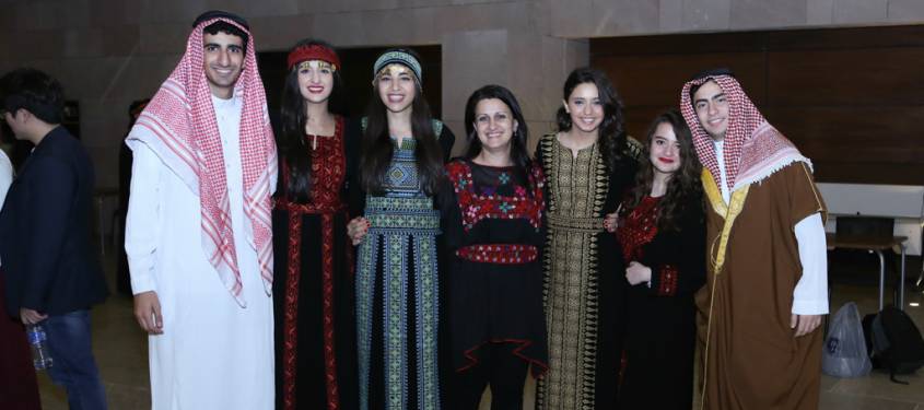 Palestinian students wearing national outfit