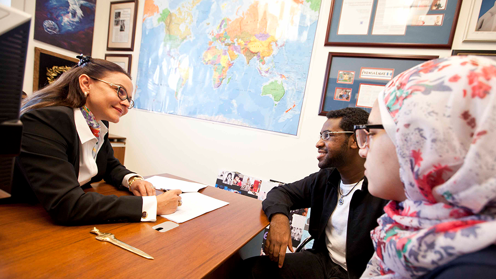 Academic dean advising students