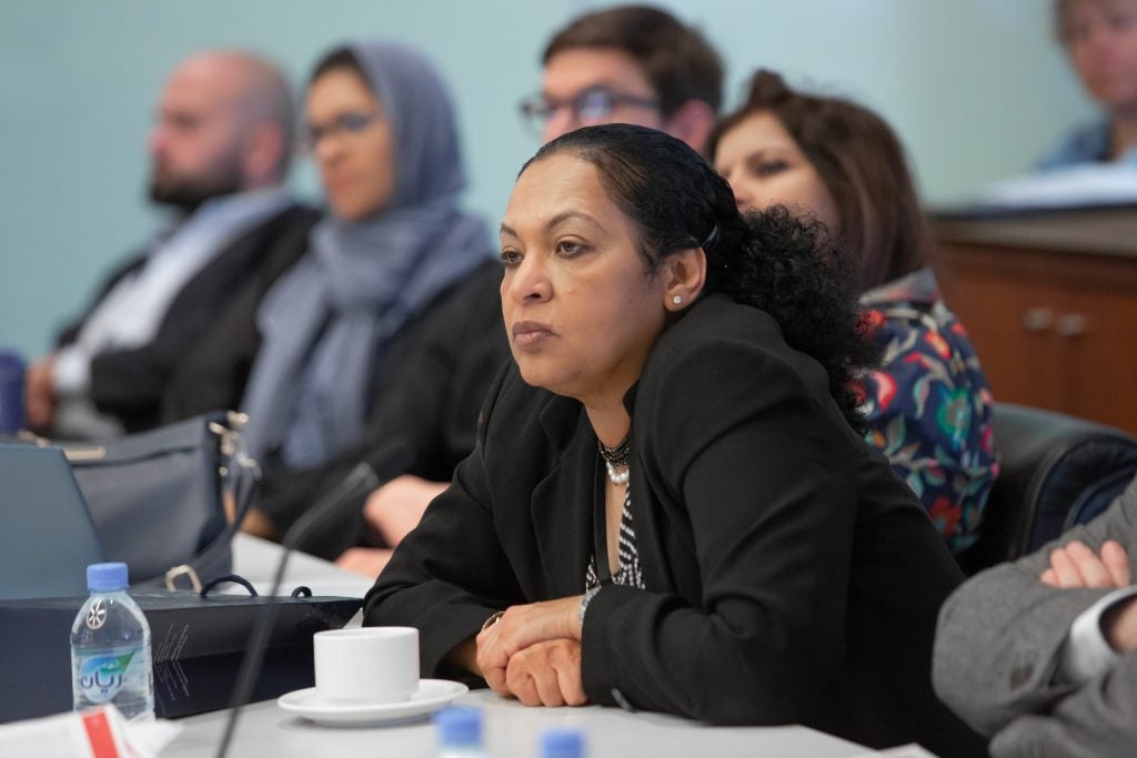 Professor Abusharaf listening to a speaker providing a talk on the Indian Ocean Studies