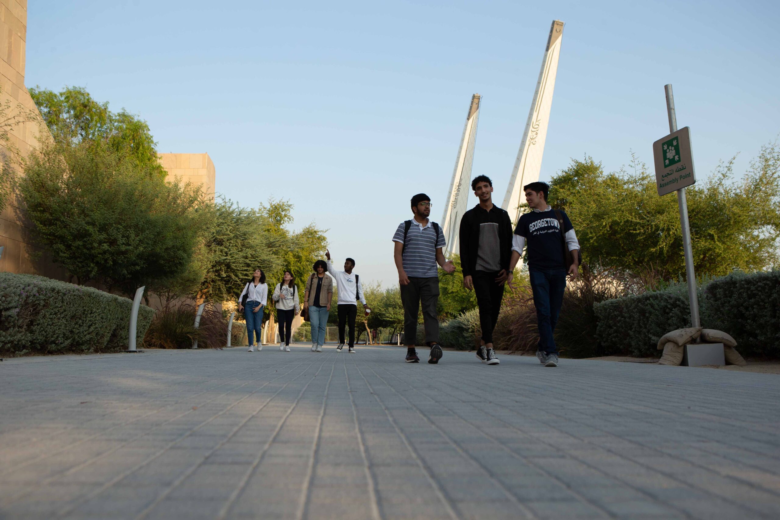 Students walking outside GU-Q building