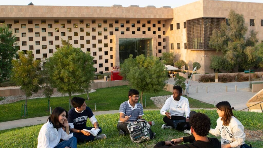 2021stock_outside_studentswithbuilding