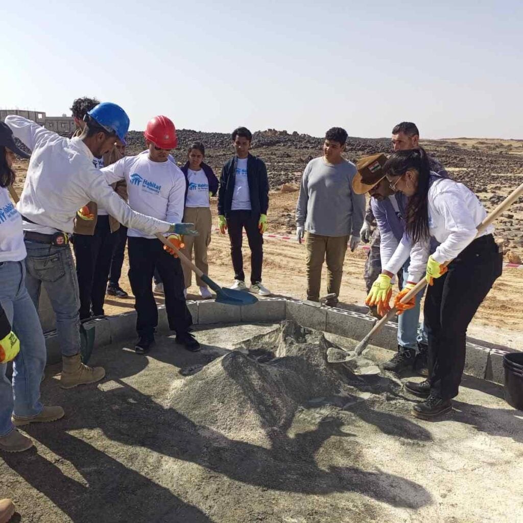 Students working at a construction site for CEP