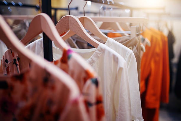 Clothing on hanger at the modern shop boutique